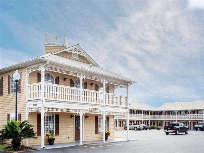 Motel Super 8 By Wyndham Foley Esterno foto