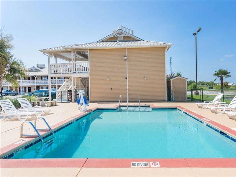 Motel Super 8 By Wyndham Foley Esterno foto